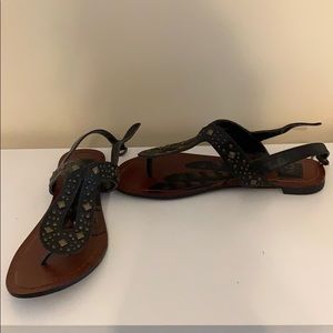 Dolce Vita Black sandals with gold studs.